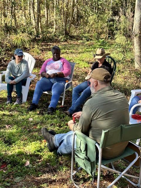 tn group together in chars during retreat